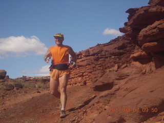 115 7j7. Canyonlands Lathrop hike/run - Adam running (tripod)