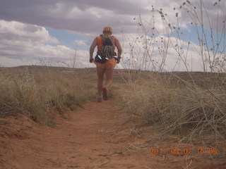 258 7j7. Canyonlands Lathrop hike/run - Adam running (tripod)