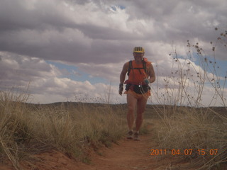 260 7j7. Canyonlands Lathrop hike/run - Adam running (tripod)