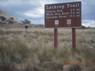 Canyonlands Lathrop hike/run - sign with Alex running