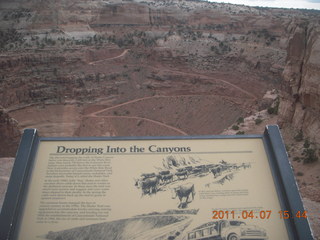 285 7j7. Canyonlands sign and dirt road into canyon