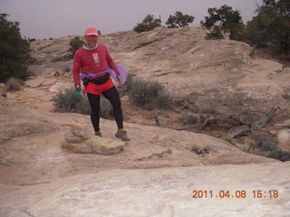 256 7j8. Canyonlands Needles Slickrock hike - Adam (tripod)