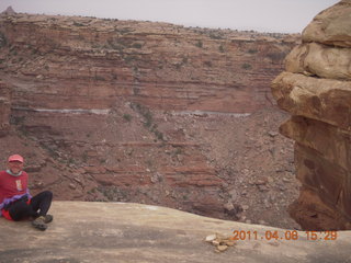 261 7j8. Canyonlands Needles Slickrock hike - Adam (tripod)