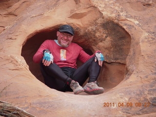 91 7j9. Arches Devil's Garden hike - Adam in hole in rock