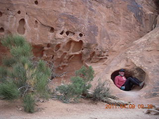 100 7j9. Arches Devil's Garden hike - Adam in hole in rock