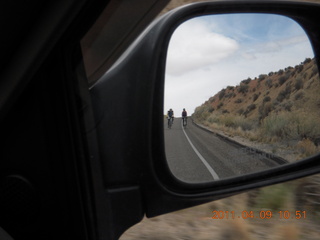 130 7j9. Arches National Park drive - bicyclists in mirror