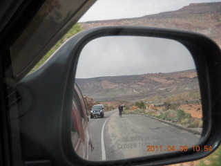 Arches National Park drive - bicyclist in mirror
