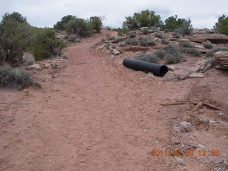 165 7j9. Dead Horse Point hike - big hose on ground