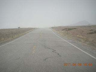 311 7j9. drive back from Dead Horse Point to Moab - hail (or something harder then rain or snow)