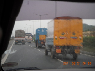 India - driving to Puducherry (Pondicherry) - yellow lorries (trucks)