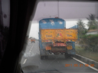 India - driving to Puducherry (Pondicherry) - yellow lorries (trucks)