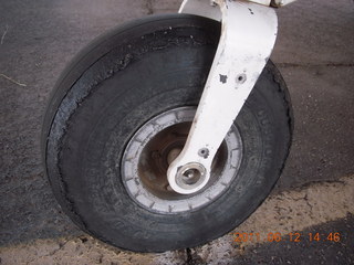 545 7lc. N8377W tire after newly-oiled runway at Rimrock (48AZ)