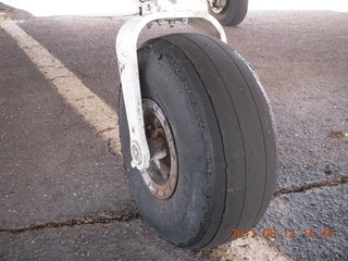 546 7lc. N8377W tire after newly-oiled runway at Rimrock (48AZ)