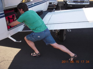 548 7lf. Sean loading his new airplane 'air-conditioner' icebox into N8377W