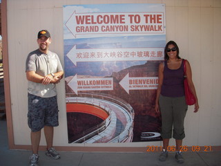 111 7ls. Welcome to the Grand Canyon Skywalk sign with Neil and Kristina