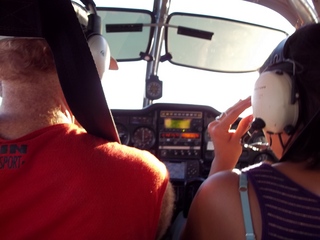 179 7ls. Adam flying N8377W with Kristina