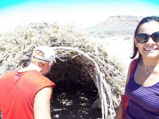 Adam and Kristina looking at display teepee