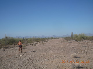 58 7mp. Windmill run with Rob - Adam running along runway - back