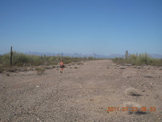 59 7mp. Windmill run with Rob - Adam running along runway - back