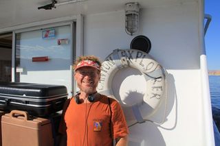 Ruhil pictures - boat tour of Lake Powell - Adam and Canyhon Explorer life preserver