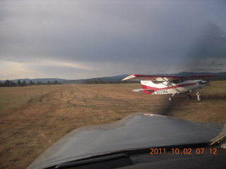 628 7q2. Negrito fly-in - taking off in N8377W