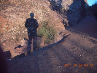 11 7q9. Arches National Park - Devil's Garden hike - Adam's shadow