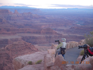 199 7q9. Dead Horse Point sunset - people taking pictures