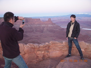 202 7q9. Dead Horse Point sunset - Joe and Jason taking pictures