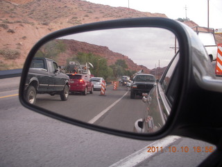 339 7qa. drive to Moab - road construction - traffic jam - in mirror