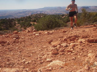 114 7qc. Canyonlands National Park - Murphy run - Adam running (tripod)