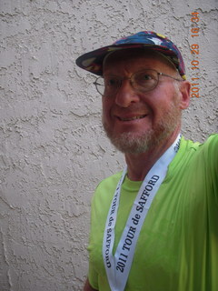 Adam with shirt and medal from Safford half-marathon race