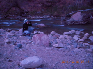 9 7sf. Zion National Park - pre-dawn Riverwalk - Gokce taking a picture on the Virgin River`