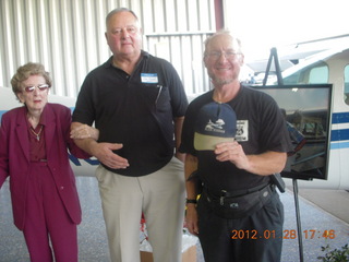 Ken Calman memorial - Ken's mother, Jim, and Adam with Ken's steel-forehead hat