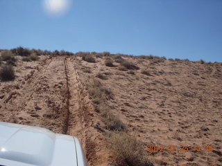 narrow-trail drive up steep hill