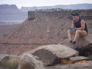 82 7x1. Canyonlands Murphy hike - Adam at vista view (tripod)