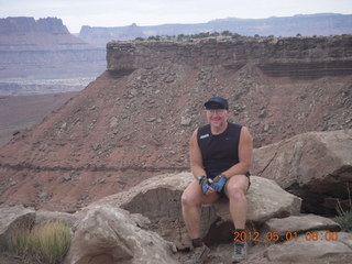 83 7x1. Canyonlands Murphy hike - Adam at vista view (tripod)