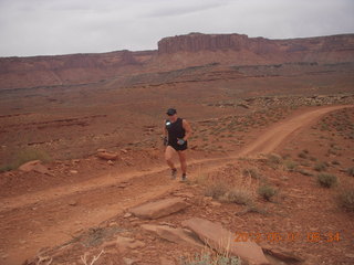 114 7x1. Canyonlands Murphy hike - Adam running (tripod)