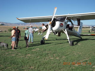 222 7x4. Mack Mesa people and an airplane