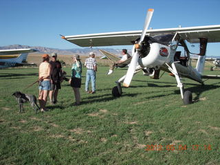 Mack Mesa people and an airplane