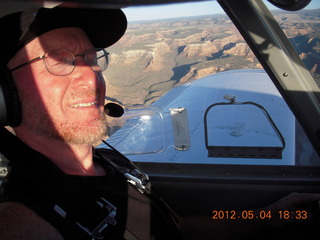 236 7x4. Adam flying N8377W over Colorado River