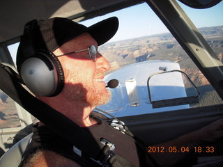 237 7x4. Adam flying N8377W over Colorado River