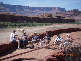 Caveman Ranch - people watching landings