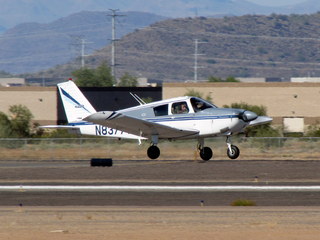 889 7y3. N8377W taking off with Greg G. in the right seat