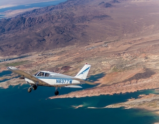 Greg A. photo - N8377W in flight