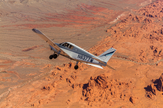 922 7y3. Greg A. photo - N8377W in flight