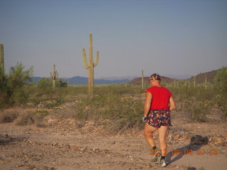 80 804. Adam running at Windmill airstrip (tripod, back)