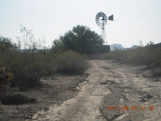 Adam running at Windmill airstrip (tripod, back)