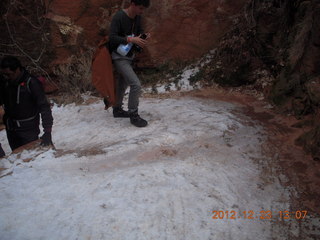 117 84p. Zion National Park - Angels Landing hike - hikers slipping on Walter's Wiggles