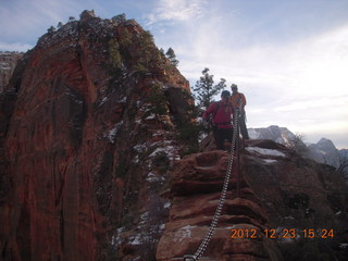 208 84p. Zion National Park - Angels Landing hike - Adam using chains