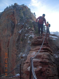 209 84p. Zion National Park - Angels Landing hike - Adam using chains
